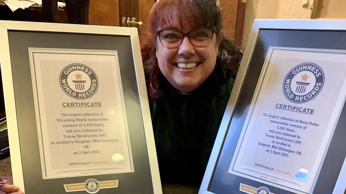 Nicol-Lewis, 47, from Mid Glamorgan, a county in Wales, U.K., was recognized by Guinness World Records in October for having both the largest "Harry Potter" collection and the largest collection of Wizarding World memorabilia. (SWNS) 