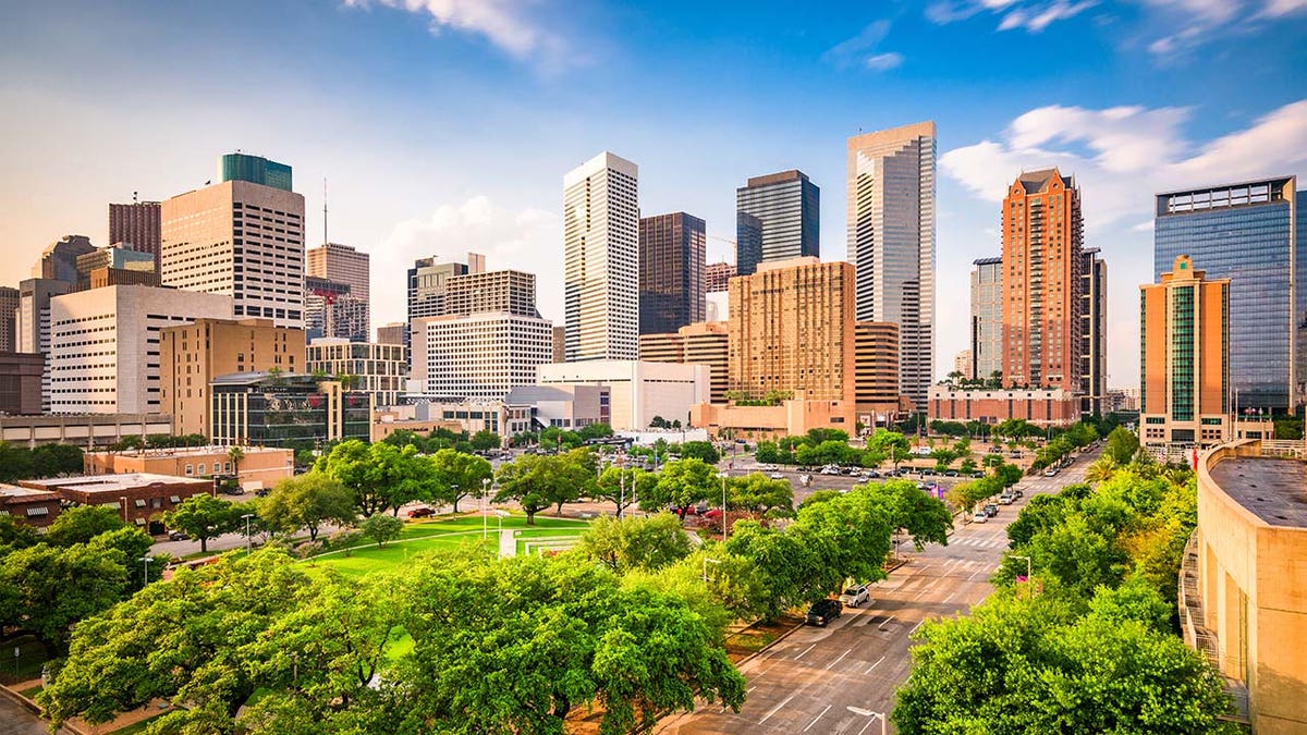 Houston, Texas, USA downtown city skyline over Root Square.