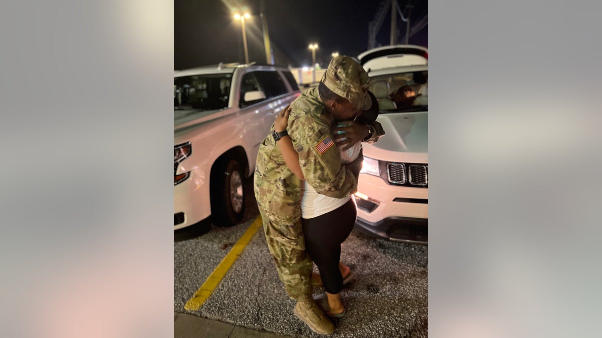 Destiny and Aaron Stovall share a moment of pure bliss when they are reunited outside Fort Benning after months apart. 