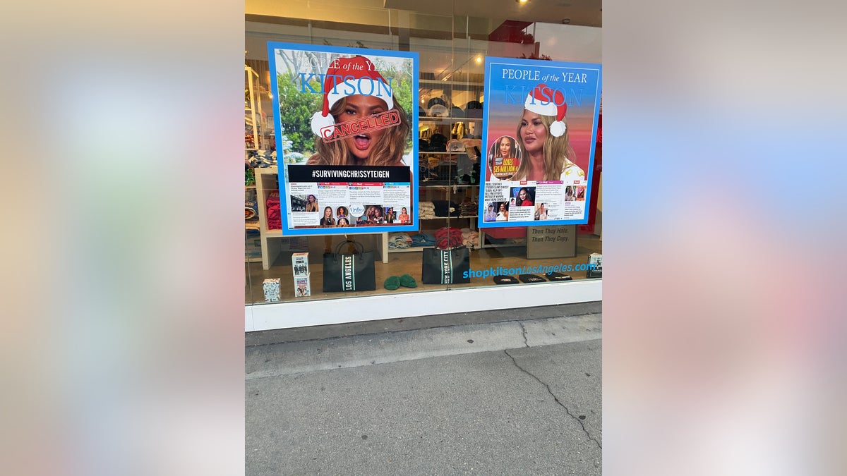 Satirical images of Chrissy Teigen are shown in the window of a clothing retailer in Los Angeles, Calif.