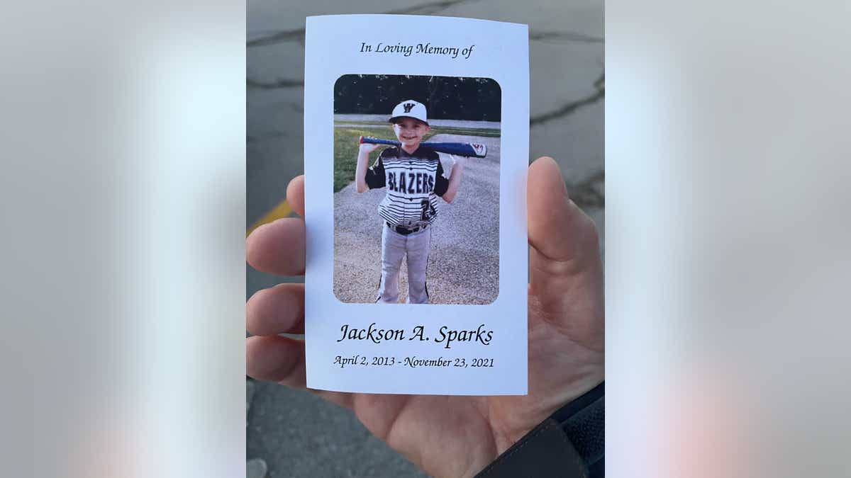 A Mass card distributed at Thursday's memorial service for Jackson Sparks. (Fox News Digital)