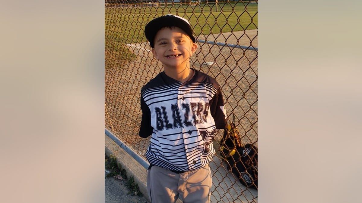 Photo included in Jackson Sparks' obituary shows the 8 year old wearing a Waukesha Sparks baseball jersey. 