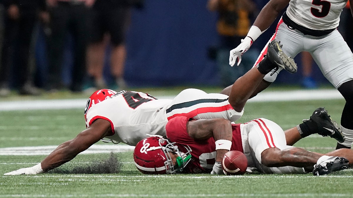 Alabama wide receiver John Metchie III misses a catch against Georgia during the Southeastern Conference championship on Saturday, Dec. 4, 2021, in Atlanta.