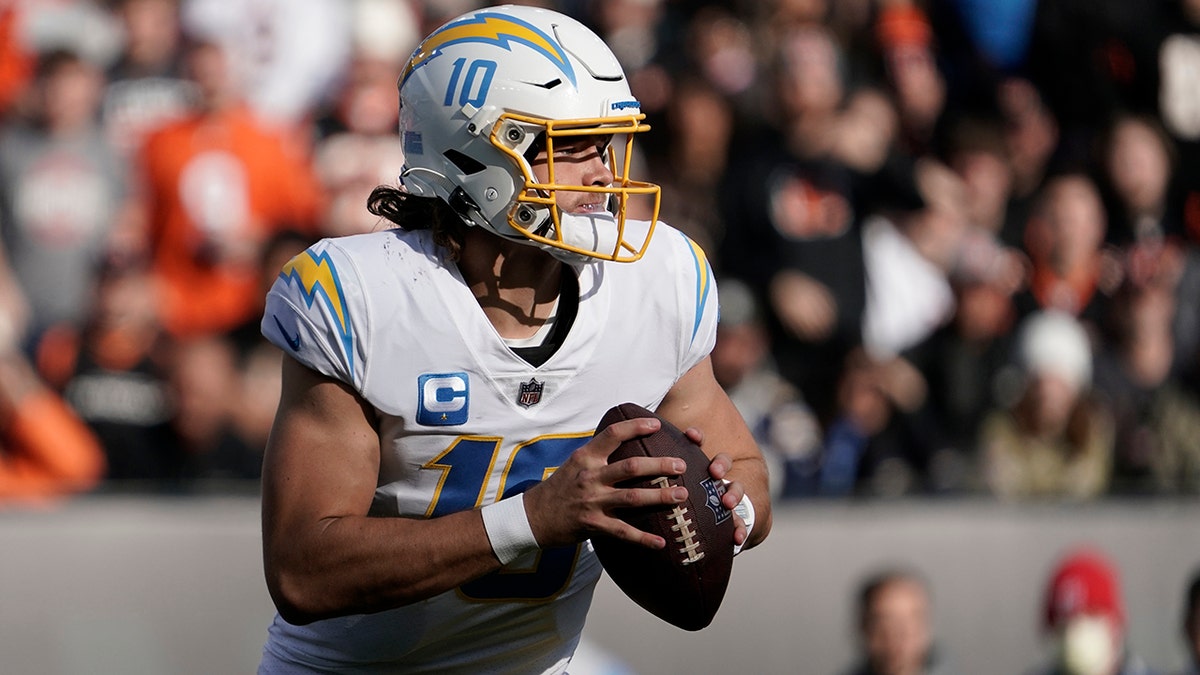 Los Angeles Chargers quarterback Justin Herbert throws against the Bengals, Sunday, Dec. 5, 2021, in Cincinnati.