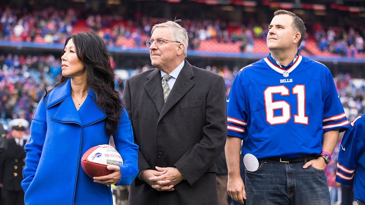 Buffalo Bills owners Kim and Terry Pegula honor the family of Buffalo Bills offensive lineman Bob Kalsu, who was killed in the Vietnam War, before the game on Nov. 27, 2016 at New Era Field in Orchard Park, New York.