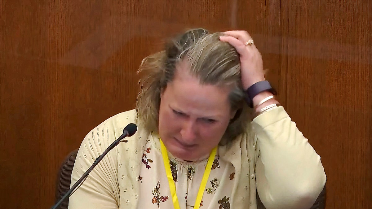 In this screen grab from video, former Brooklyn Center Police Officer Kim Potter becomes emotional as she testifies in court, Friday, Dec. 17, 2021 at the Hennepin County Courthouse in Minneapolis, Minn. 