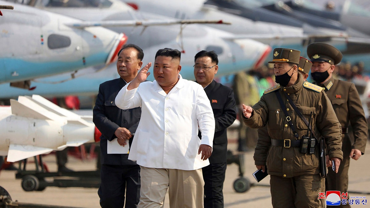 North Korea's Kim Jon Un walking