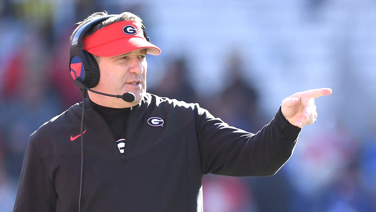 Head coach Kirby Smart of the Georgia Bulldogs gestures on the sidelines during the fourth quarter against the Georgia Tech Yellow Jackets at Bobby Dodd Stadium on November 27, 2021 in Atlanta, Georgia.