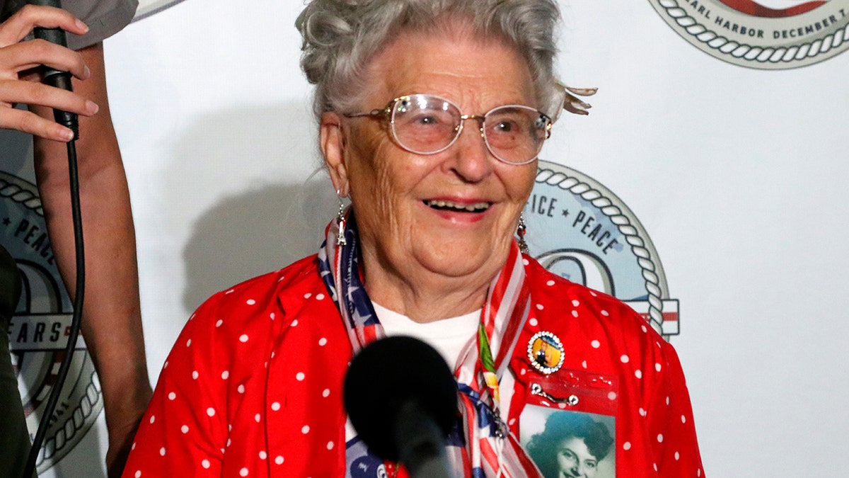 Mae Krier, who worked at a Boeing plant during the war, speaks at a news conference in Pearl Harbor, Hawaii, on Sunday, Dec. 5, 2021. 