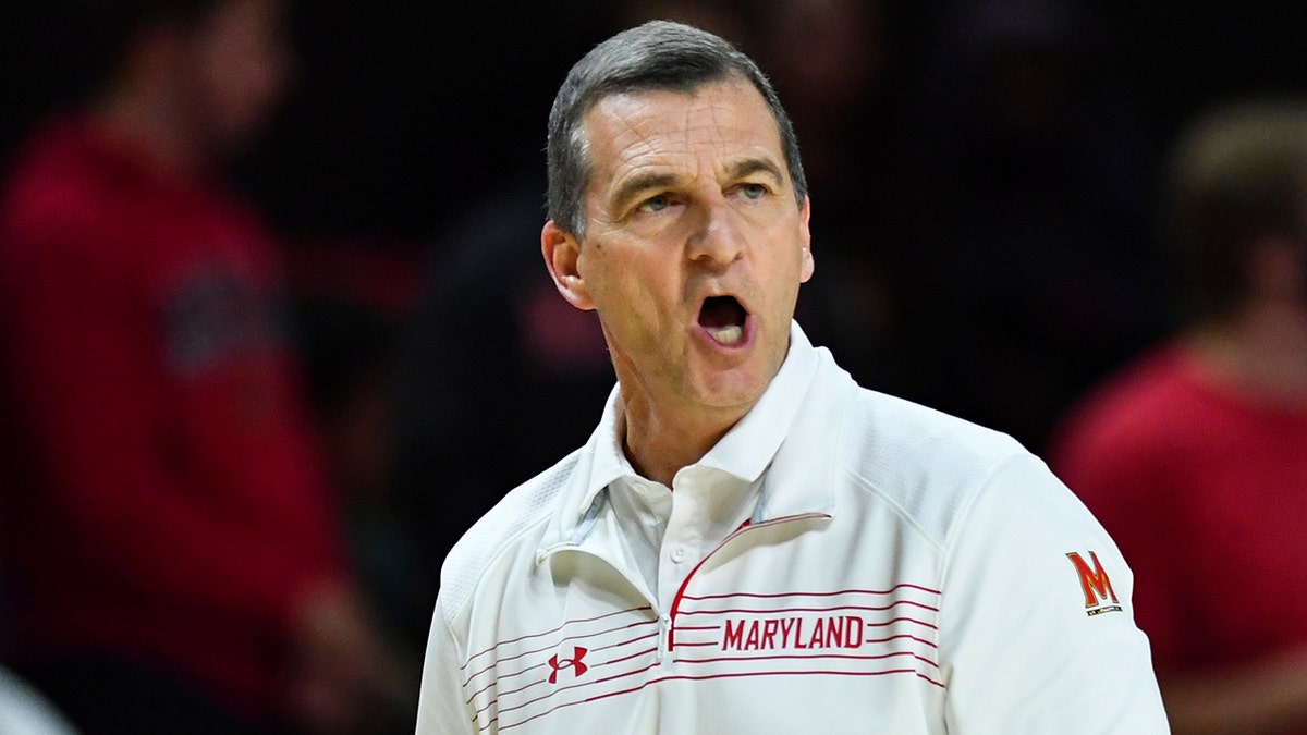 Maryland head coach Mark Turgeon calls a play to his team during the first half of an NCAA college basketball game against Hofstra, Friday, Nov. 19, 2021, in College Park, Md.