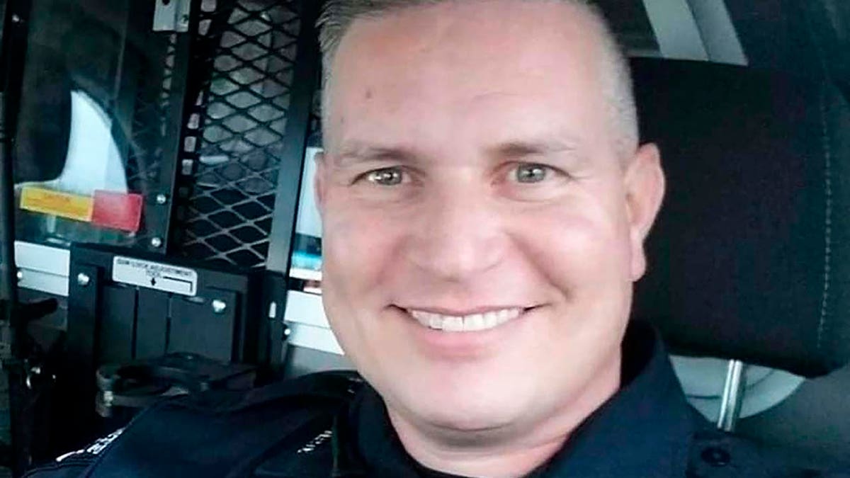 Mesquite Officer Richard Houston was killed Friday while responding to a disturbance call outside a suburban Dallas supermarket. (Family Photo/Courtesy of Mesquite Police Department via AP)