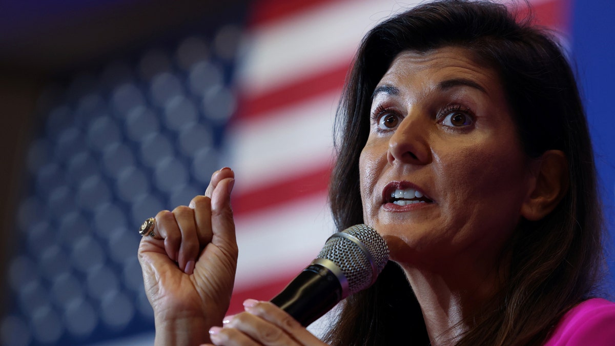 Nikki Haley, the former Governor of South Carolina and Ambassador to the UN, stumps for Virginia gubernatorial candidate Glenn Youngkin (R-VA), during a campaign event in McLean, Virginia, U.S., July 14, 2021. REUTERS/Evelyn Hockstein