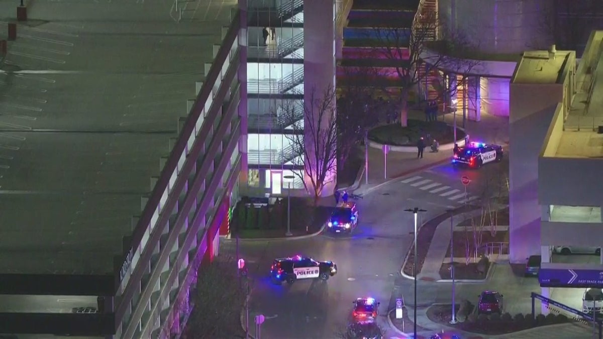 Two suspects were in police custody and one remained at large after shots rang out at a Chicago-area shopping mall on Thursday night.