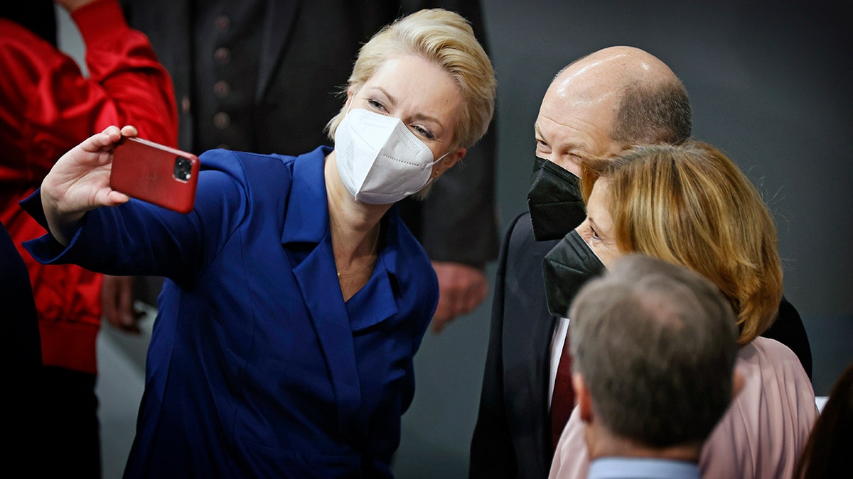 Manuela Schwesig, SPD, prime minister of the German state of Mecklenburg-Western Pomerania, Olaf Scholz, designated Federal Chancellor, and Malu Dreyer, SPD, prime minister of the German state of Rhineland-Palatinate, are pictured during the meeting of the German Bundestag. (Photo by Florian Gaertner/Photothek via Getty Images)