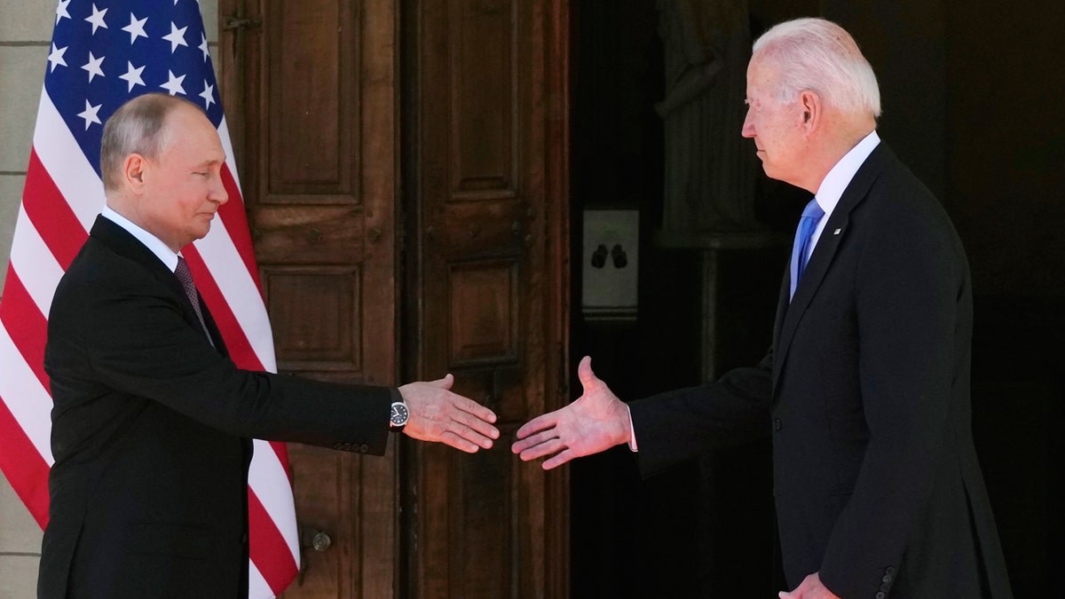 FILE - President Joe Biden and Russian President Vladimir Putin, arrive to meet at the 'Villa la Grange', in Geneva, Switzerland, June 16, 2021. (AP Photo/Alexander Zemlianichenko, File Pool)