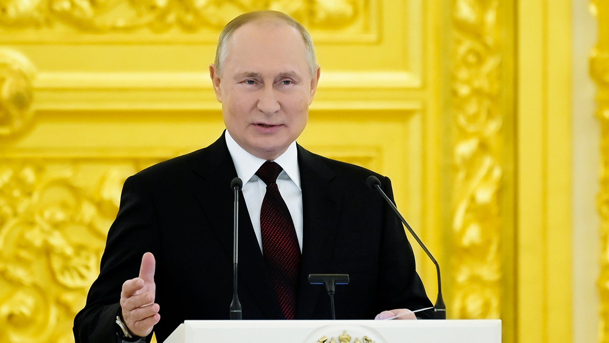 Russian President Vladimir Putin speaks during a ceremony to receive credentials from foreign ambassadors in Kremlin, in Moscow, Russia, Wednesday, Dec. 1, 2021. 
