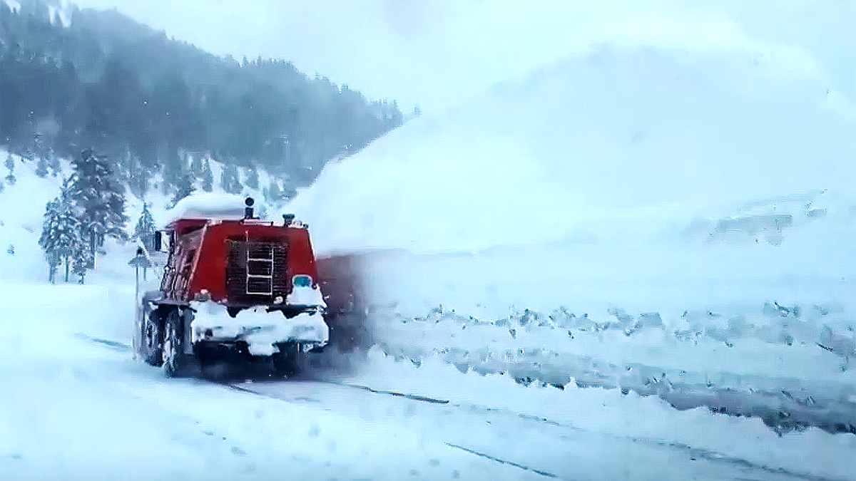 A vehicle clears snow along Interstate-80 in the Lake Tahoe region this week.