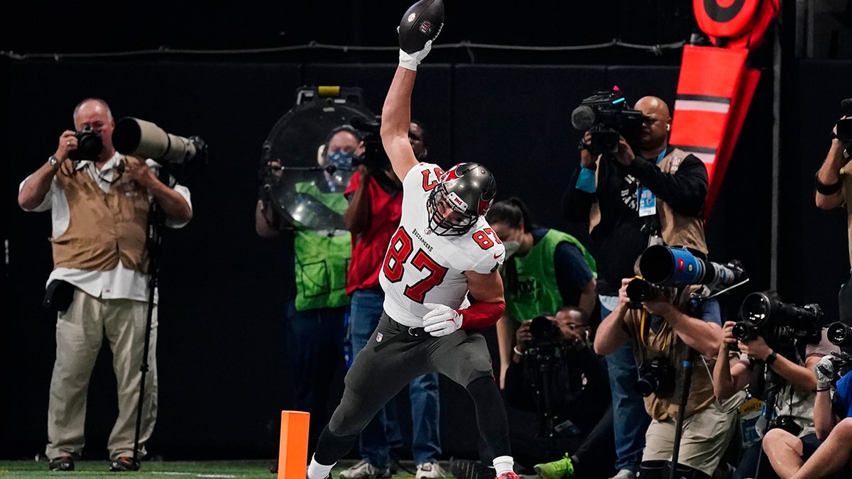 Tampa Bay Buccaneers tight end Rob Gronkowski celebrates his touchdown against the Atlanta Falcons during the second half of an NFL football game, Sunday, Dec. 5, 2021, in Atlanta.