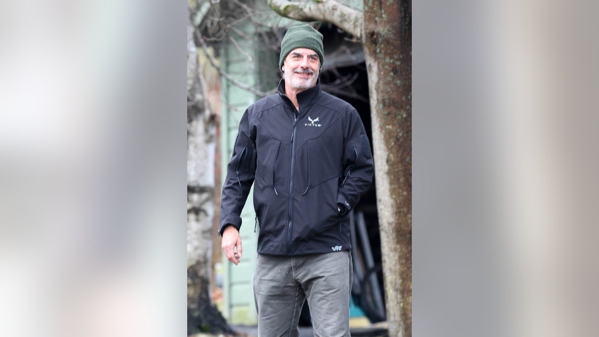 Chris Noth is all smiles while enjoying a walk out in chilly Great Barrington, Massachussets on Wednesday.