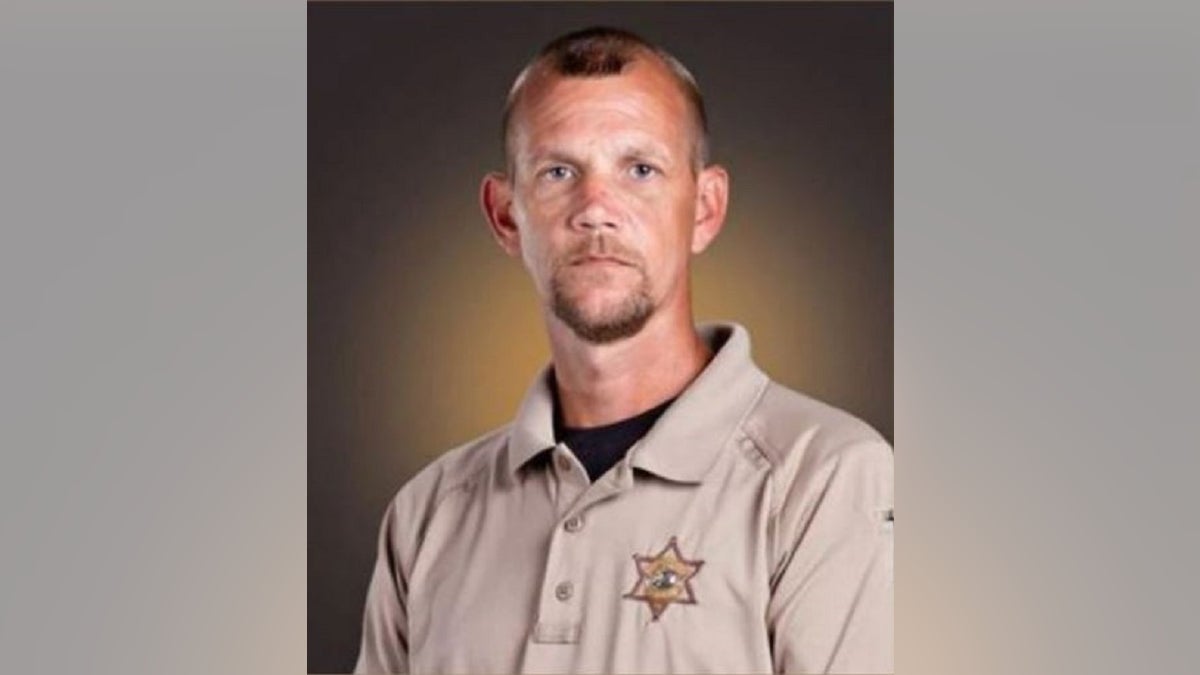 Wayne County Sheriff's Deputy Sean Riley was killed early on Dec. 29. A manhunt resulted in the arrest of a suspect linked to other crimes across state lines, authorities said. 