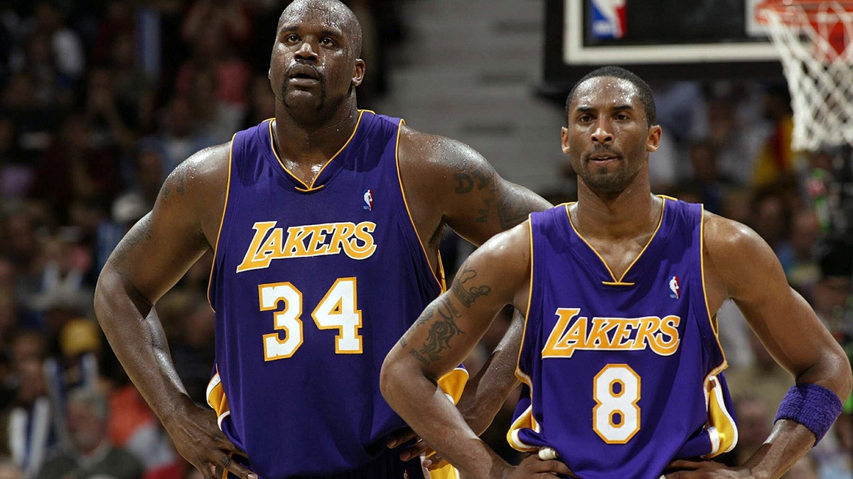MINNEAPOLIS - MAY 29: Shaquille O'Neal #34 and Kobe Bryant #8 of the Los Angeles Lakers stand on the court while playing againt the Minnesota Timberwolves in Game Five of the Western Conference Finals during the 2004 NBA Playoffs on May 29, 2004 at Target Center in Minneapolis, Minnesota.