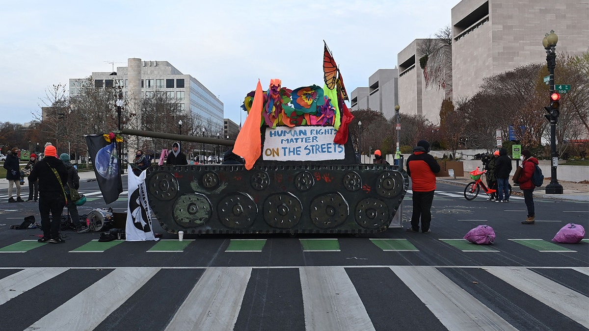 Activists block streets near the U.S. Capitol in Washington on Dec. 7, 2021.