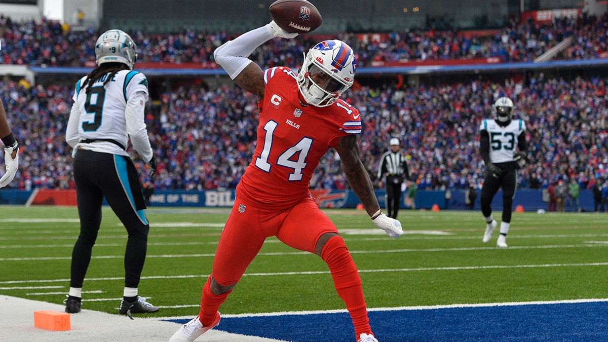 Buffalo Bills wide receiver Stefon Diggs (14) celebrates after scoring a touchdown in the first half of an NFL football game against the Carolina Panthers, Sunday, Dec. 19, 2021, in Orchard Park, N.Y.