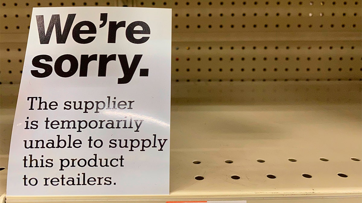 A sign is seen on the shelf at a CVS store in Queens, New York. 