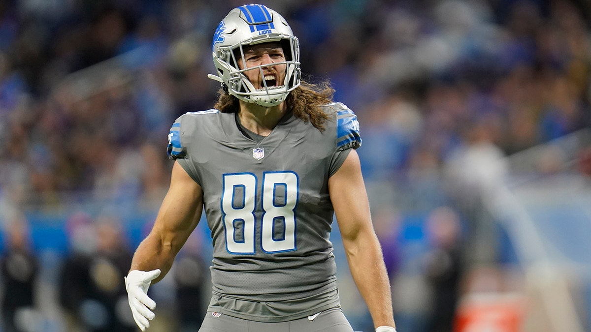 Detroit Lions tight end T.J. Hockenson reacts after his touchdown during the first half against the Minnesota Vikings Sunday, Dec. 5, 2021, in Detroit.