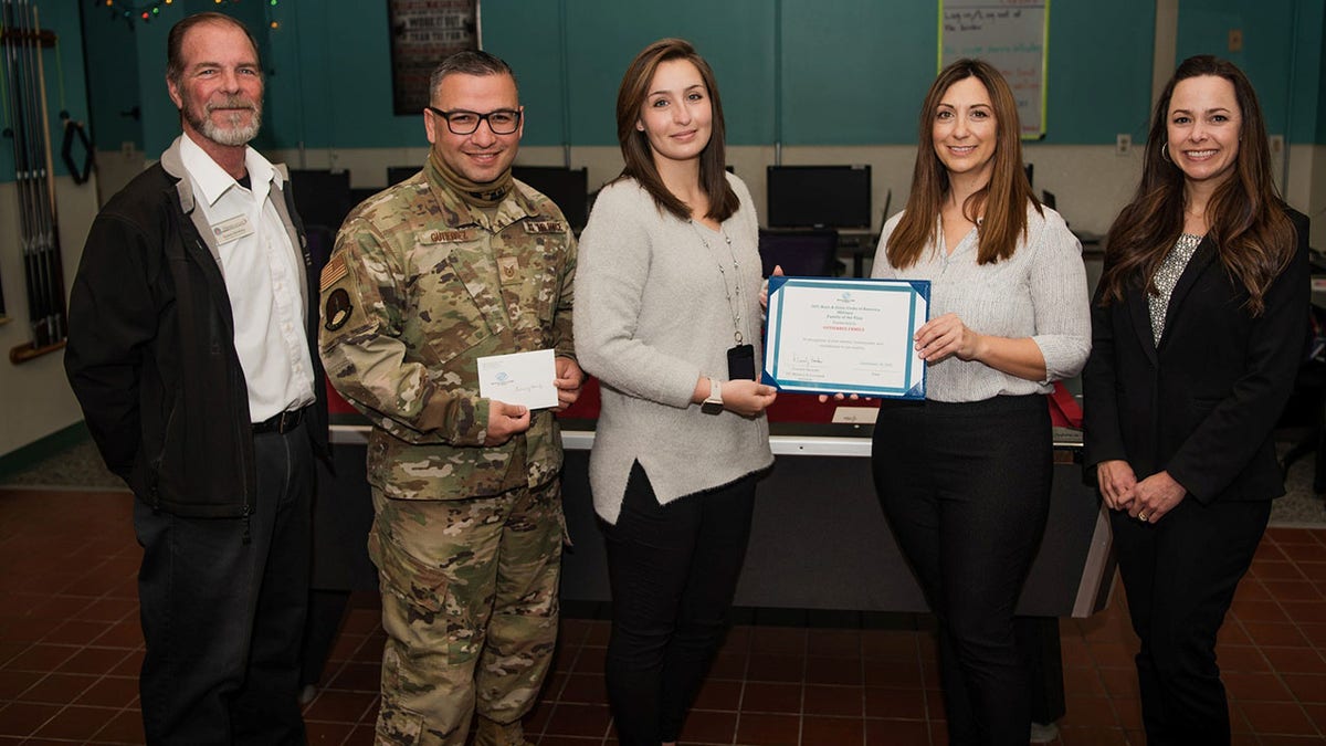 The couple was awarded as the Boys and Girls Clubs of America military family of the year for their work as foster parents. (Lenny Juliano/Courtesy of the U.S. Air Force)