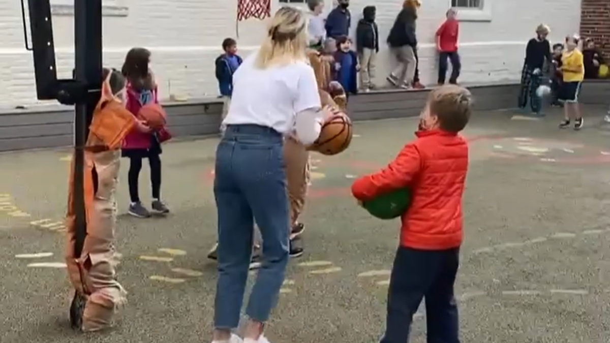 Elementary school teacher Kathleen Fitzpatrick has gone viral after she put hot chocolate on the line with a basketball shot.
