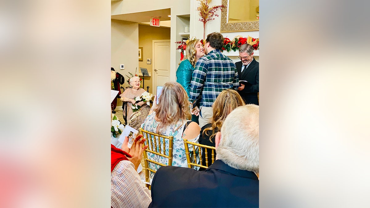 Juanita Courtney has three children, eight grandchildren, 12 great-grandchildren and five great-great-grandchildren with a sixth on the way. Seen in this image photographed on Dec. 24 is Courtney serving as matron of honor at her great-great-granddaughter Ashley Stewart's wedding in Knoxville, Tenn.