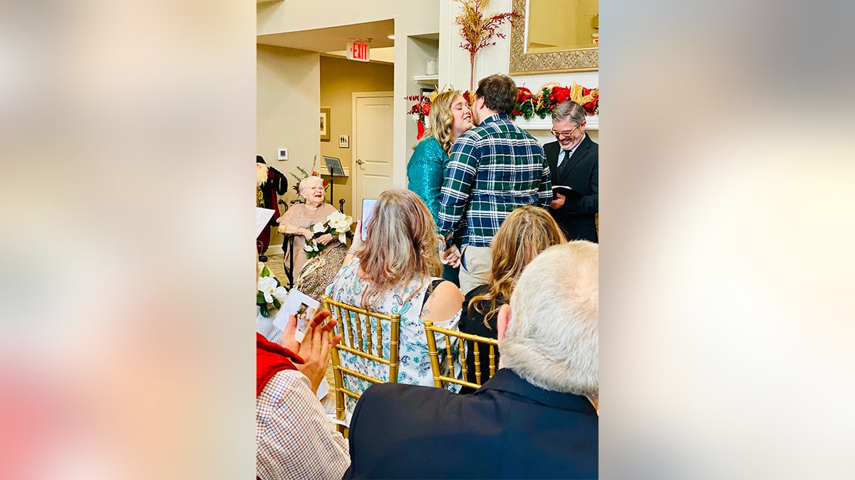 Juanita Courtney has three children, eight grandchildren, 12 great-grandchildren and five great-great-grandchildren with a sixth on the way. Seen in this image photographed on Dec. 24 is Courtney serving as matron of honor at her great-great-granddaughter Ashley Stewart's wedding in Knoxville, Tenn.