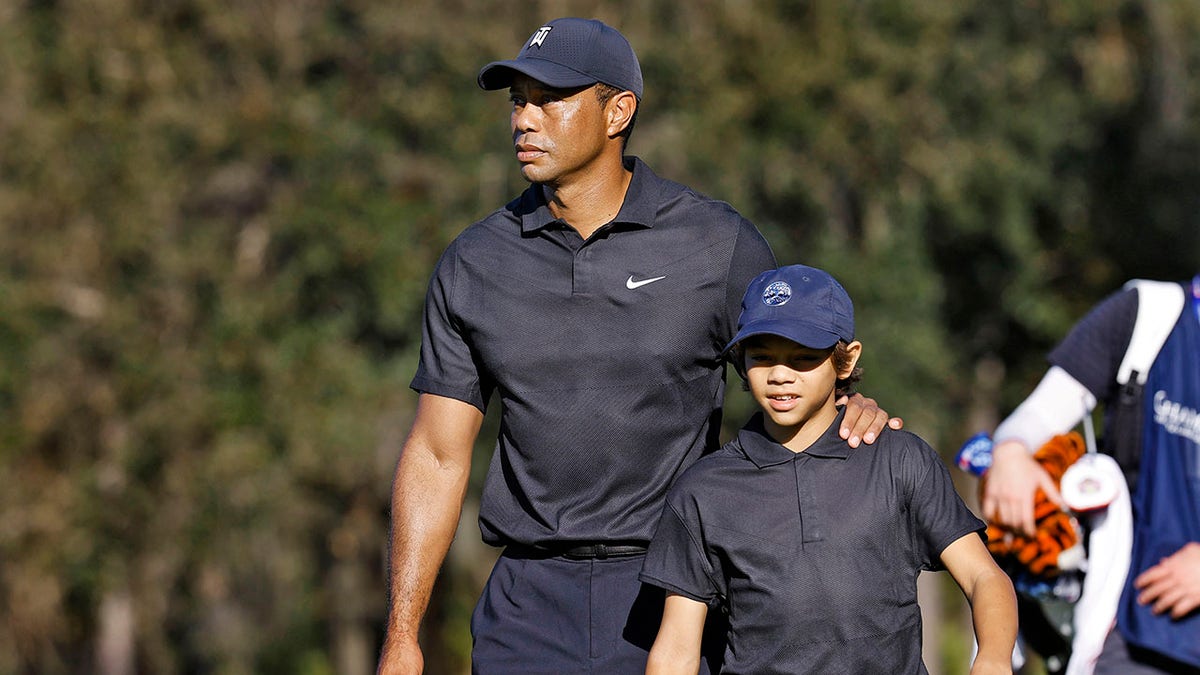 Tiger Woods and Charlie Woods 