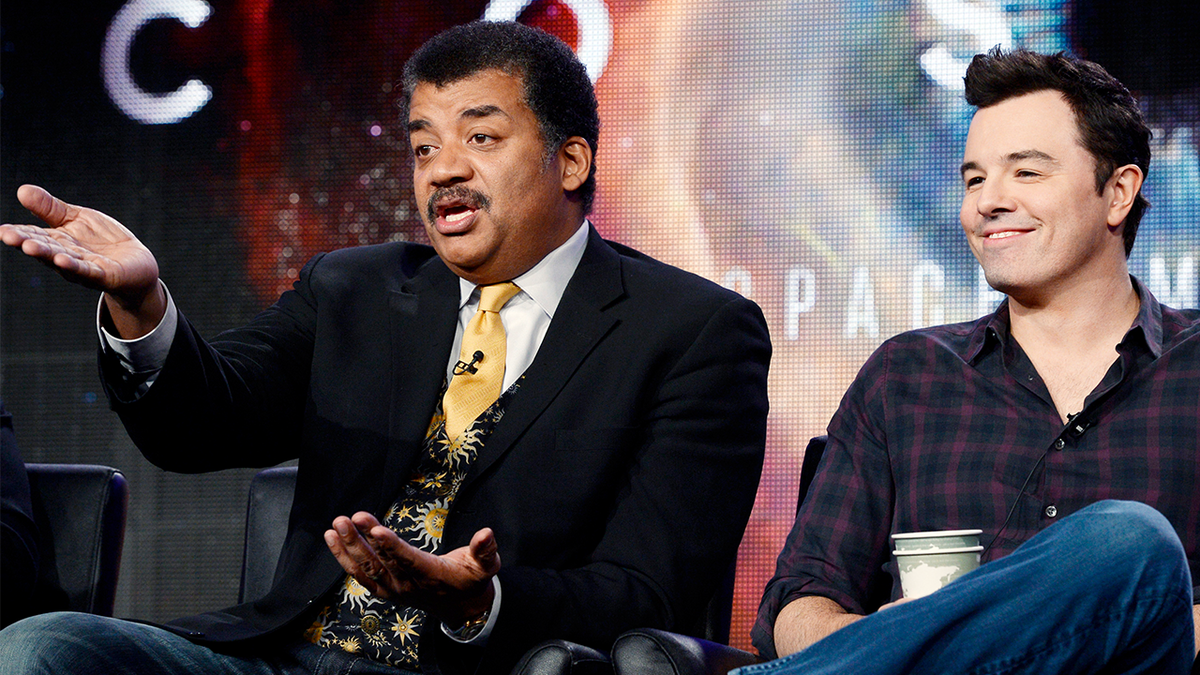 FILE – Host Neil DeGrasse Tyson (L) and Seth MacFarlane, executive producer of "Cosmos", participate in Fox Broadcasting Company's part of the Television Critics Association (TCA) Winter 2014 presentations in Pasadena, California, January 13 , 2014. 