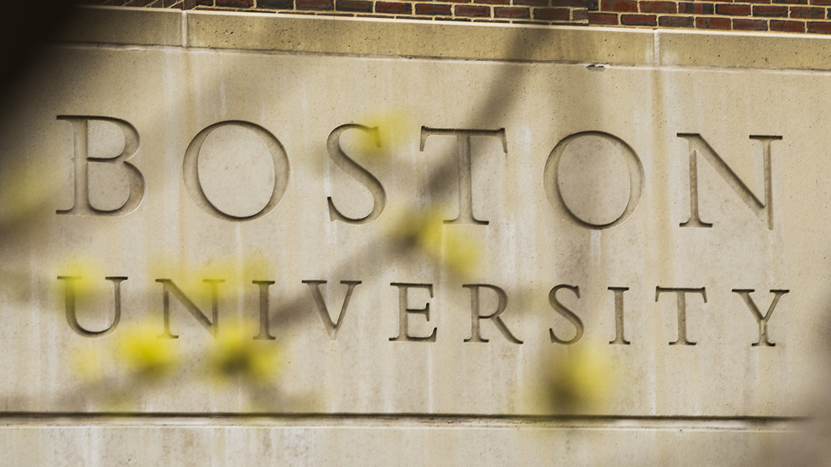 Signage is displayed at Boston University in Boston, Mass., in April 2020.