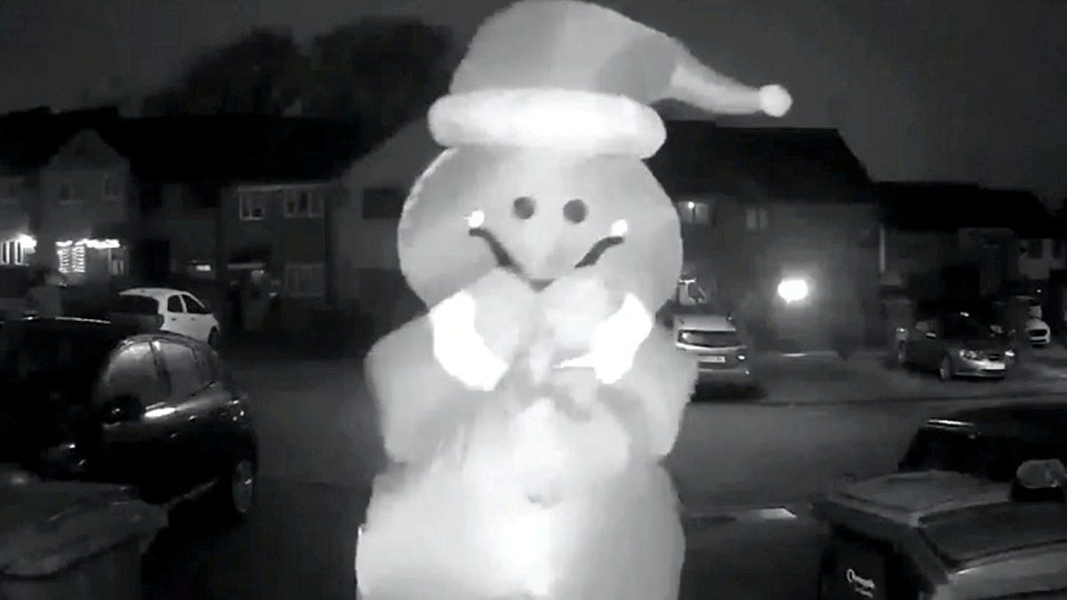 A mystery secret Santa has been caught on CCTV spreading Christmas cheer