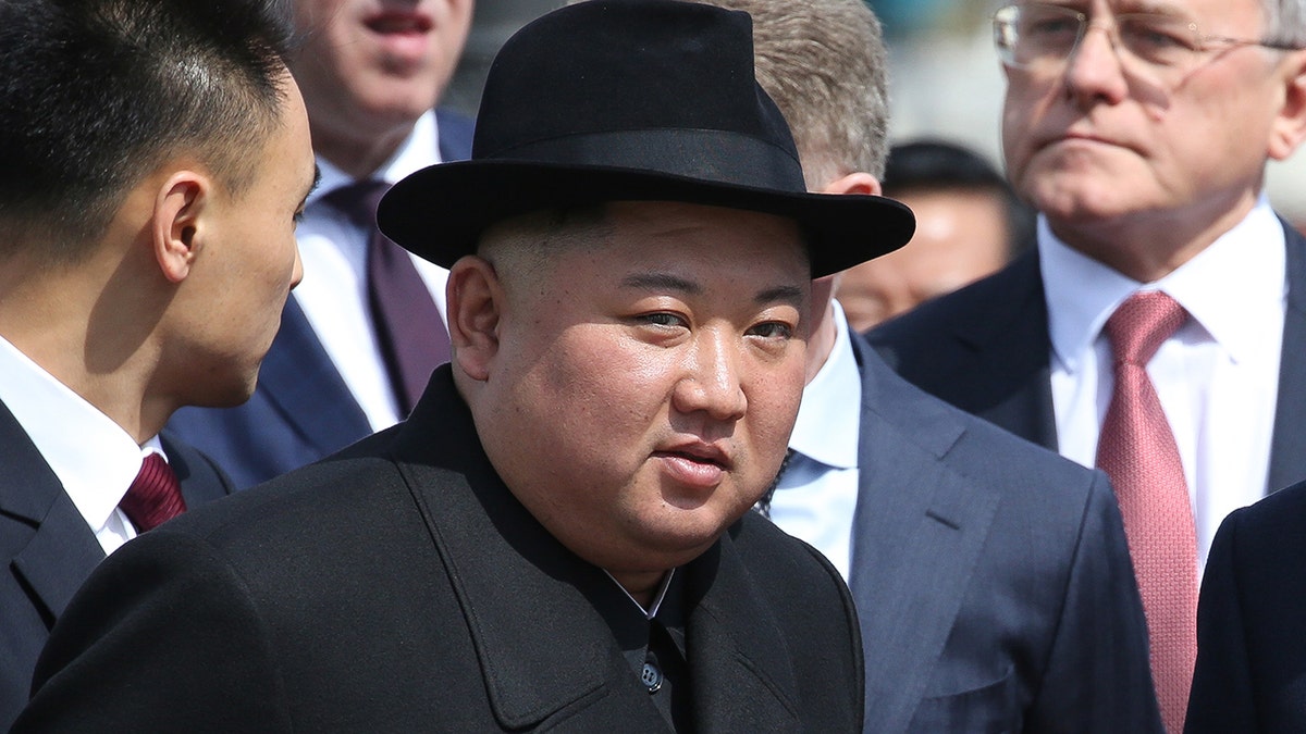 Kim Jong Un, North Korea's leader, watches an honor guard before his departure to North Korea at the railway station in Vladivostok, Russia, on Friday, April 26, 2019.