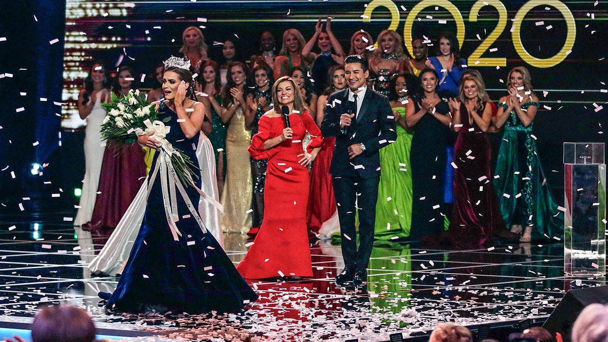 Virginia's Camille Schrier walks the stage after winning the Miss America competition at the Mohegan Sun casino in Uncasville, Connecticut, Dec. 19, 2019.?