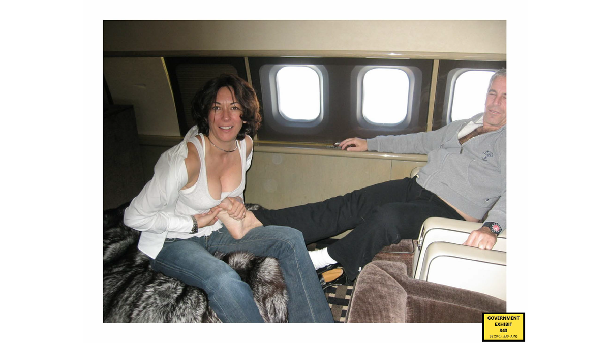 Ghislaine Maxwell rubbing Jeffrey Epstein's foot on a private jet
