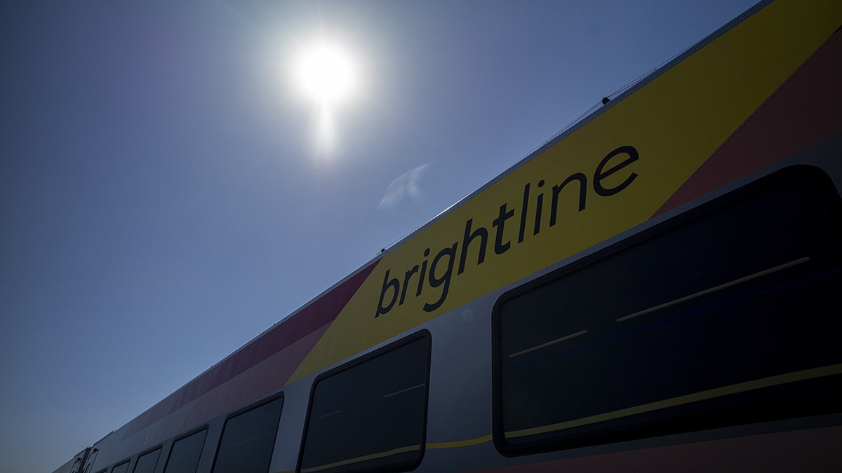 A Brightline express inter-city train during a media tour of the Siemens Mobility facilities in Sacramento, California, U.S., on Tuesday, Sept. 28, 2021. Recently, two people were killed after a train hit a car trying to make it around the crossing gate.