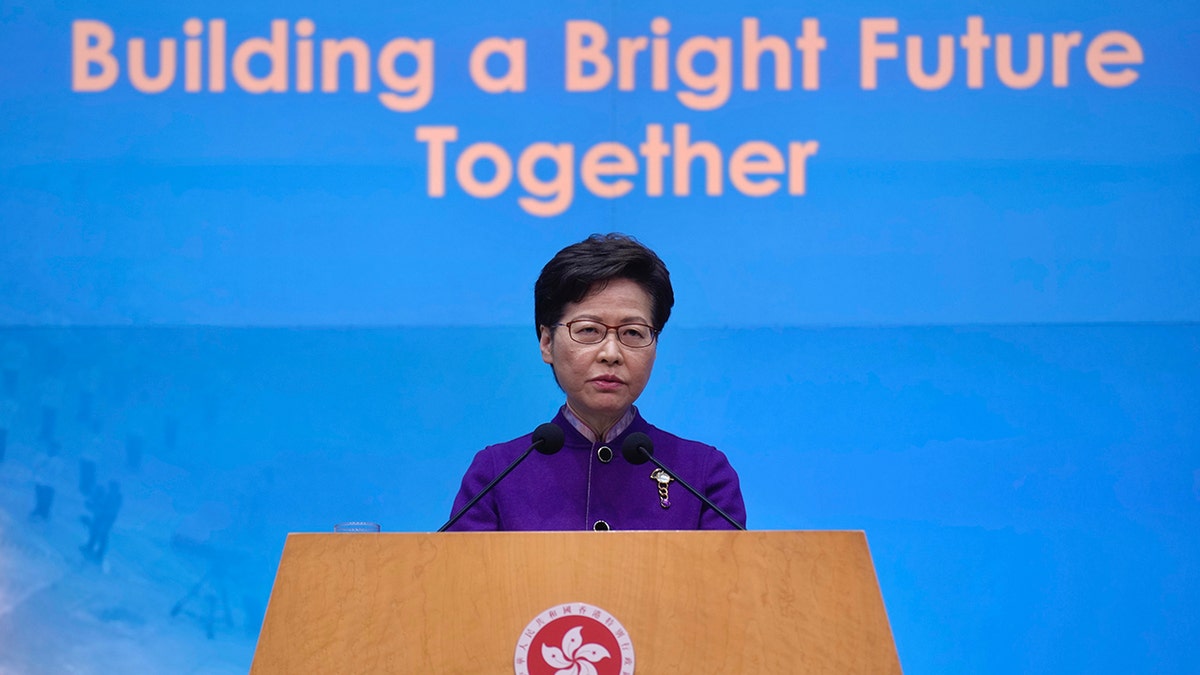 Hong Kong Chief Executive Carrie Lam listens to reporters' questions during a press conference in Hong Kong, Monday, Dec. 20, 2021.