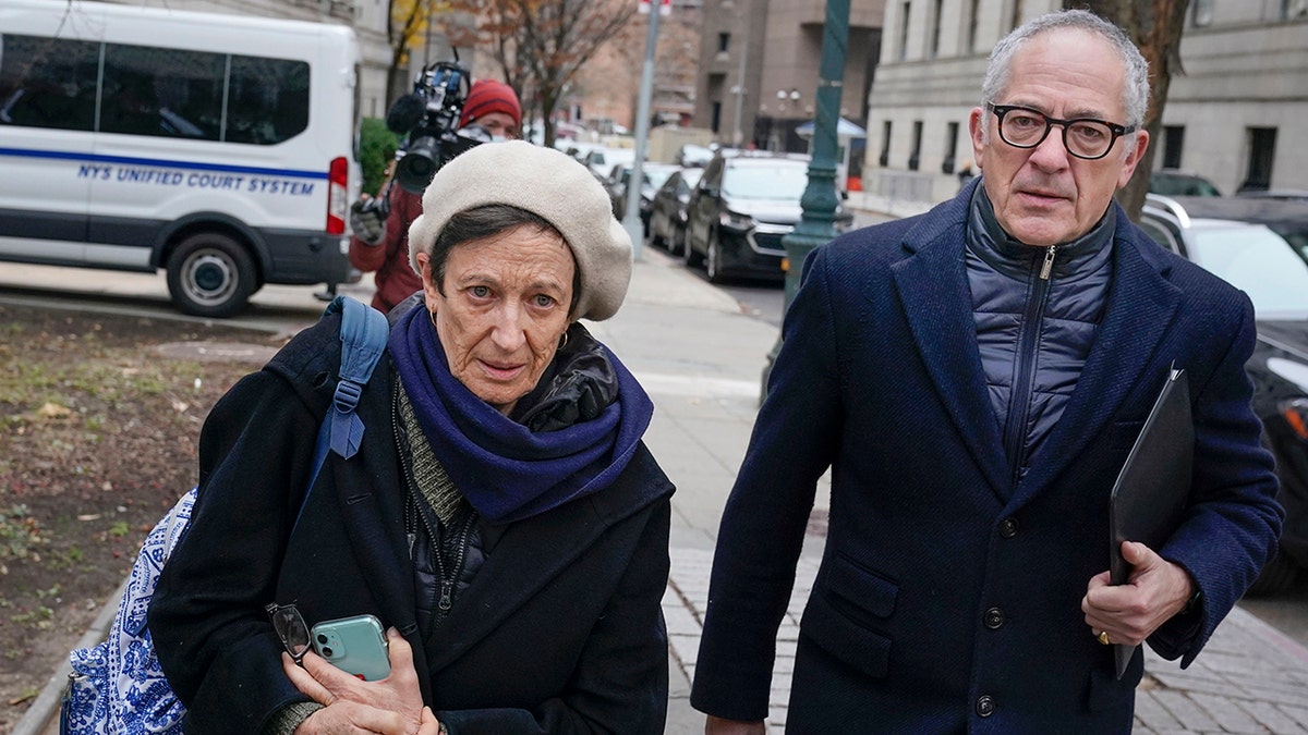 Isabel and Kevin Maxwell leave the courthouse during a lunch break in the trial of their sister, Ghislaine Maxwell, in New York on Dec. 8, 2021.