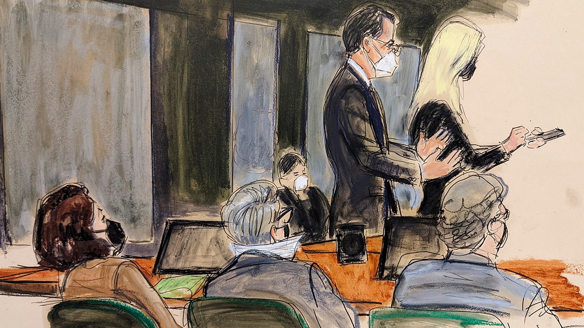 In this courtroom sketch, Ghislaine Maxwell, seated, left, watches her defense attorneys Christian Everdell and Laura Menninger, right, argue regarding a jury note that asked for clarity about a charge during her sex trafficking trial, Monday, Dec. 27, 2021, in New York. 