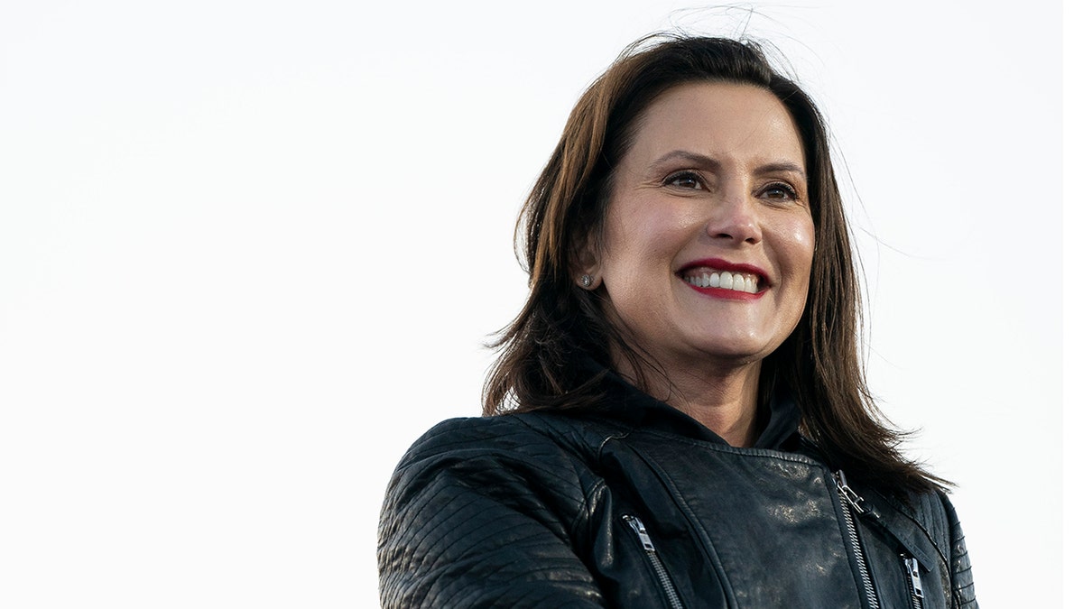 Michigan Gov. Gretchen Whitmer speaks during a drive-in campaign rally with Democratic presidential nominee Joe Biden and former President Obama at Belle Isle on Oct. 31, 2020, in Detroit.