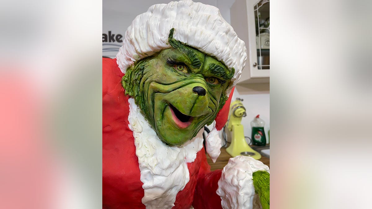 Talented mom Lara Mason who baked a life-sized Grinch cake