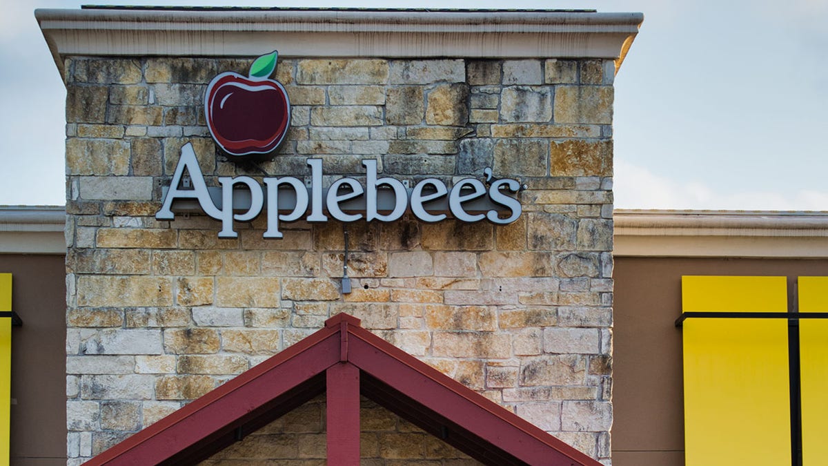 Applebee's restaurant storefront at a Houston, TX location.