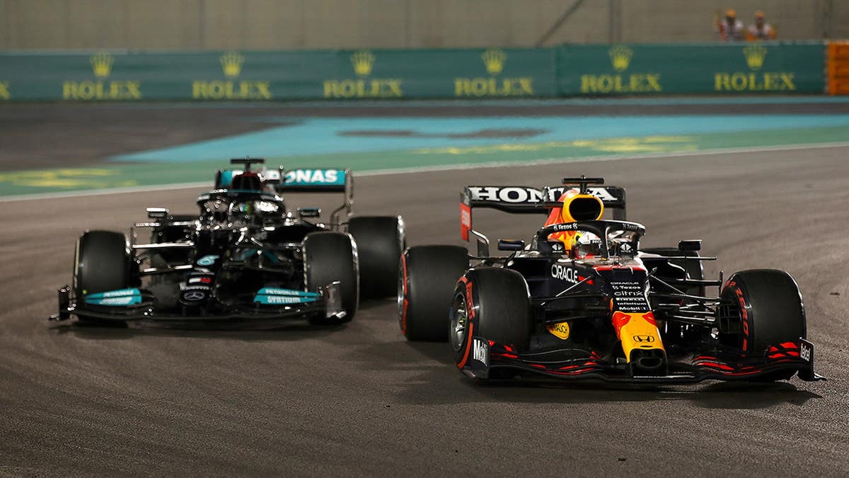 Red Bull's Max Verstappen passed Mercedes' Lewis Hamilton on the last lap of the Abu Dhabi Grand Prix.