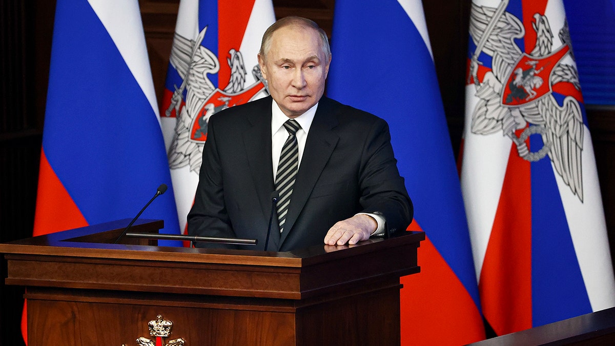 Russian President Vladimir Putin addresses an extended meeting of the Russian Defense Ministry Board at the National Defense Control Center in Moscow, Russia, Tuesday, Dec. 21, 2021. 