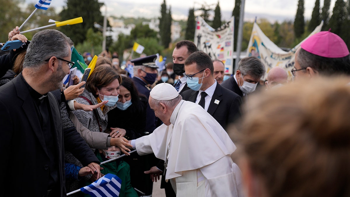 Pope Francis visits Saint Dionysius School of the Ursuline Sisters in Athens, Greece, Monday, Dec. 6, 2021. 